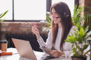 Woman working in call center of voip